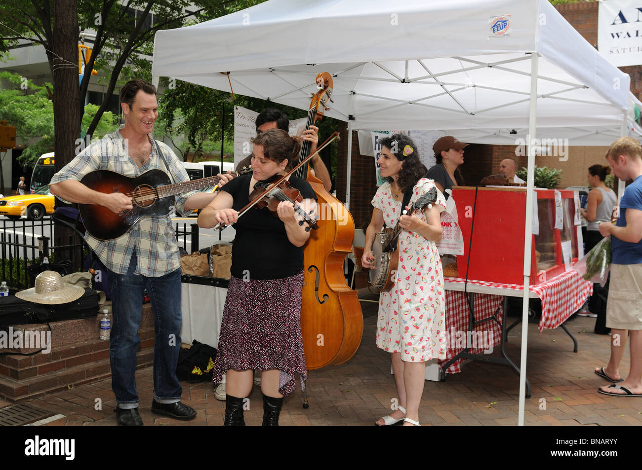 Melody Allegra Bluegrass Band played for the opening day of the Andaz Market in Lower Manhattan. Stock Photo