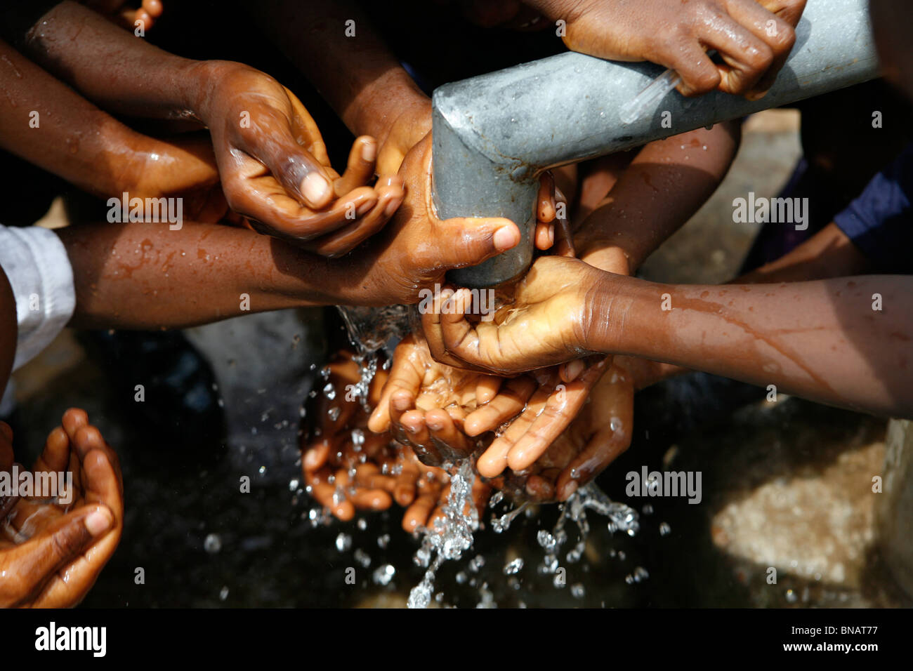 children with water, Sierra Leone, West Africa Stock Photo