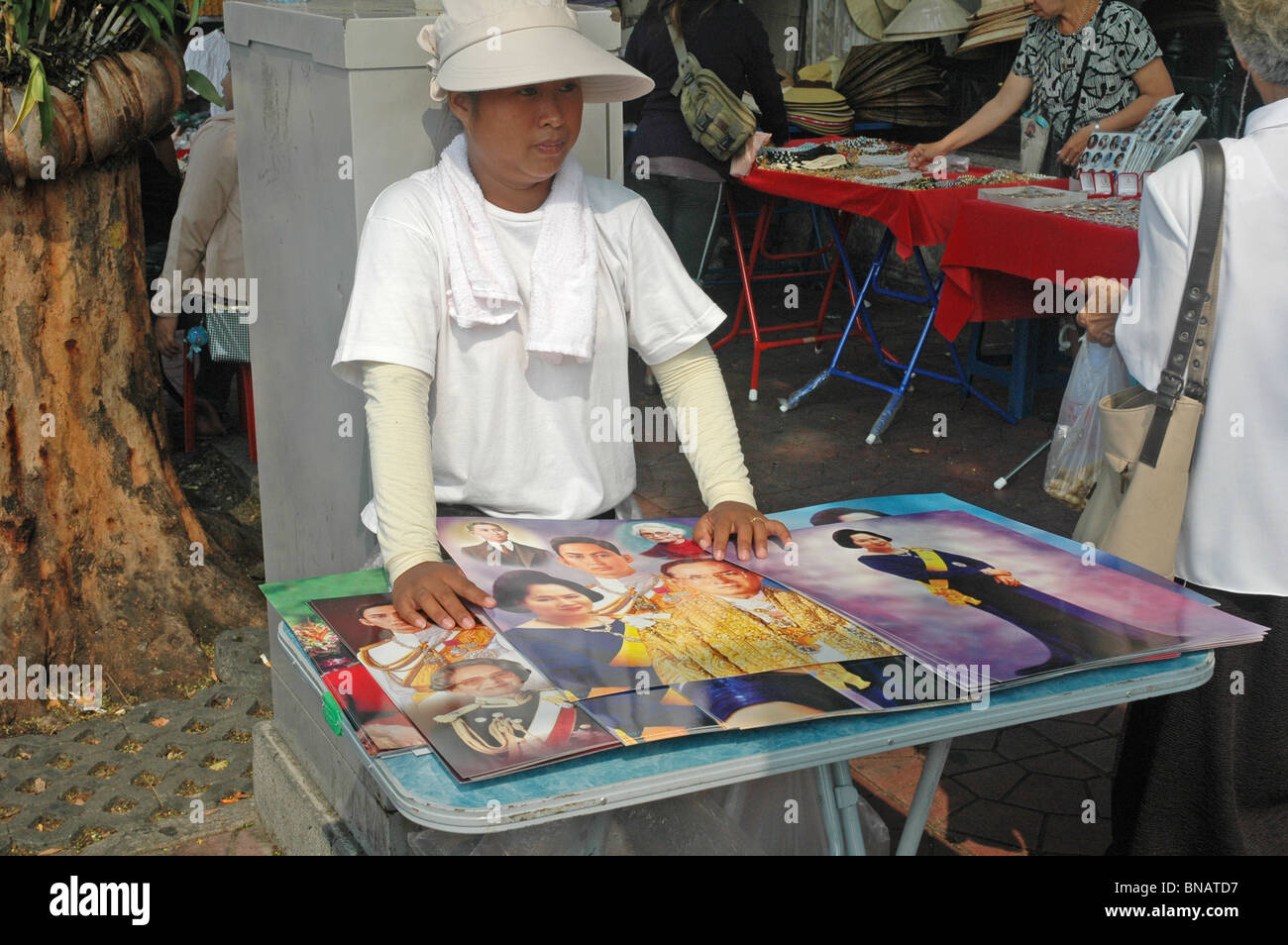 A Thai news vendor on a Bangkok Street Stock Photo