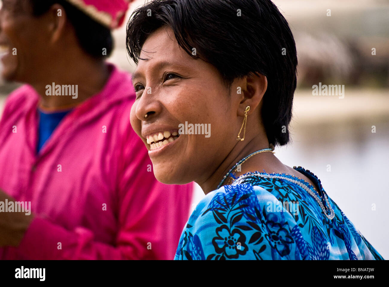 Close up of an attractive, smiling, Kuna lady wearing her mola blouse and traditional nose stud. Stock Photo