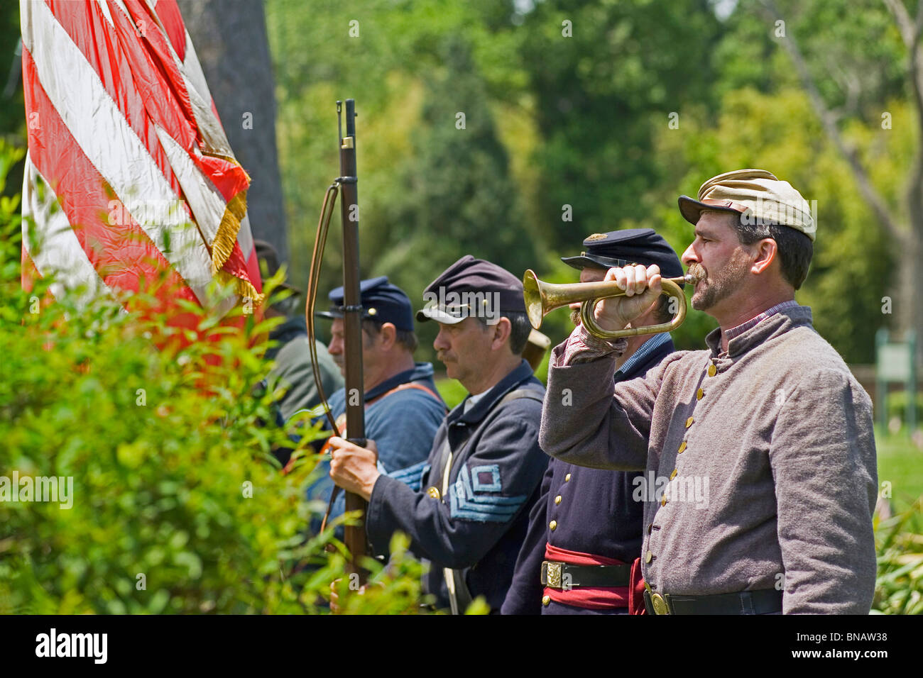 A military bugler sounds the call during a Civil War reenactment at Yorktown Battlefield in Colonial National Historical Park in Yorktown, Virginia. Stock Photo