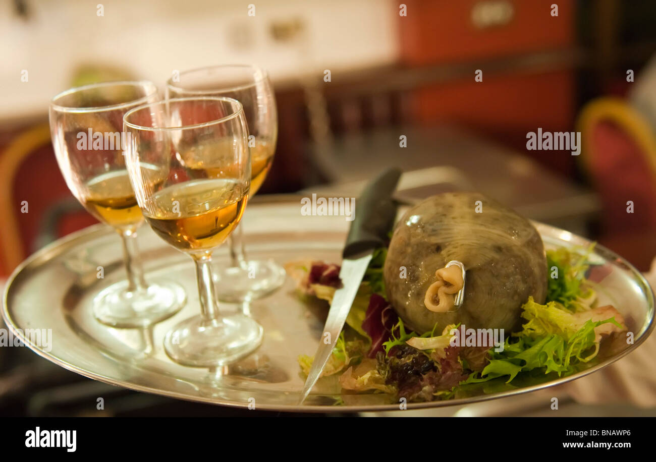 A tray with haggis and glasses of whisky at Burn''s supper night Stock Photo