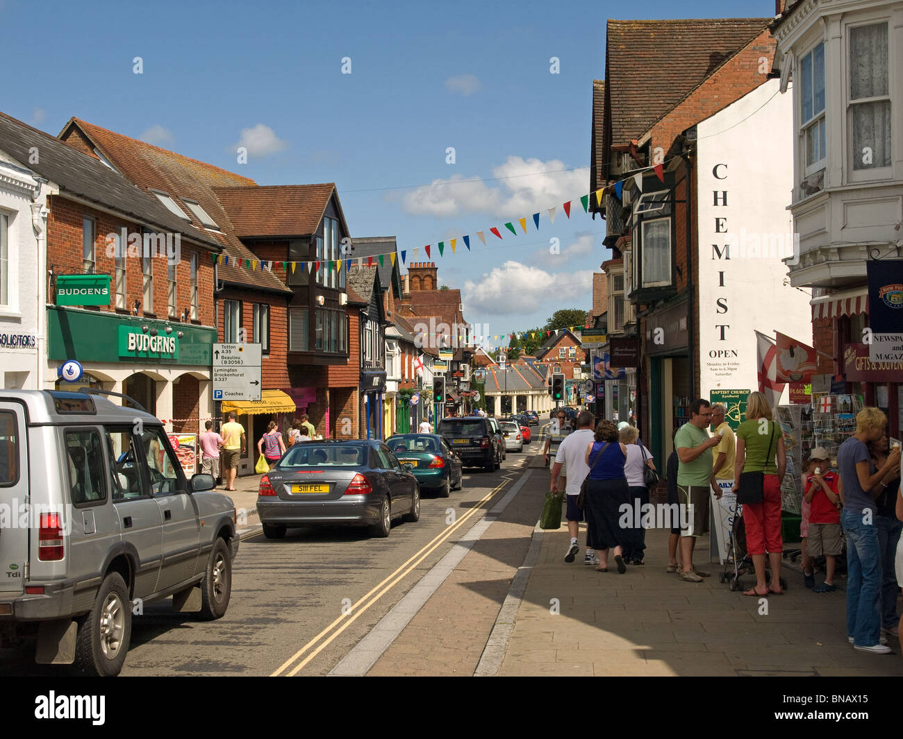 Queue of traffic in Lyndhurst High Street New Forest Hampshire England UK Stock Photo