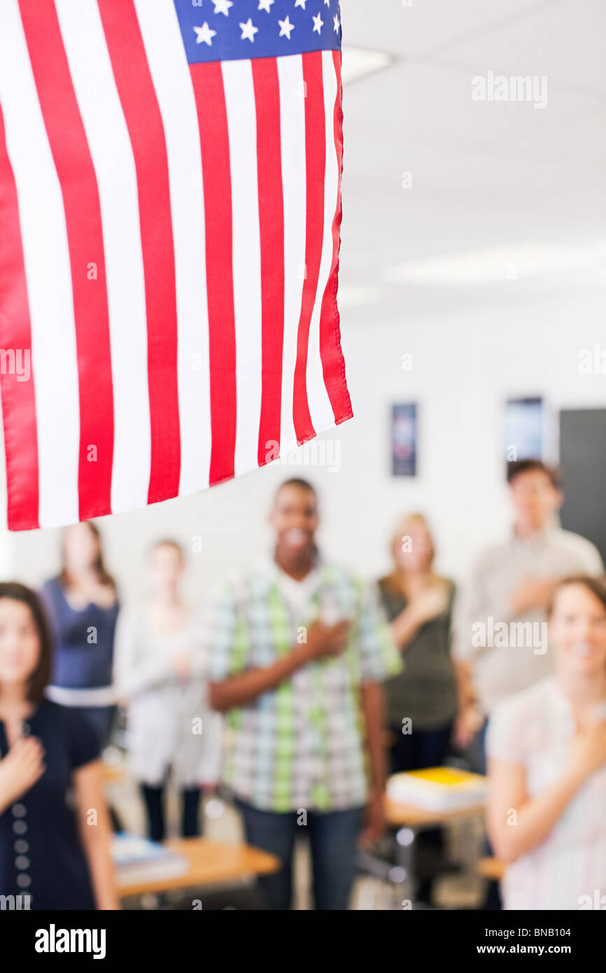 High school students swearing allegiance to the American flag Stock Photo