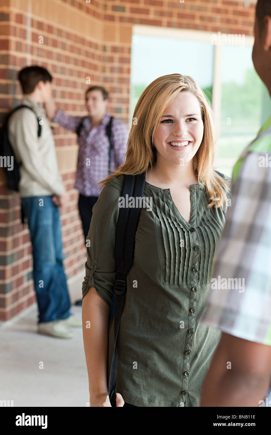High school classmates chatting stock photo alamy