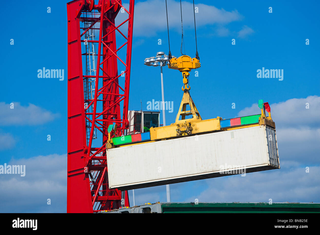 Crane lifting cargo container Stock Photo Alamy