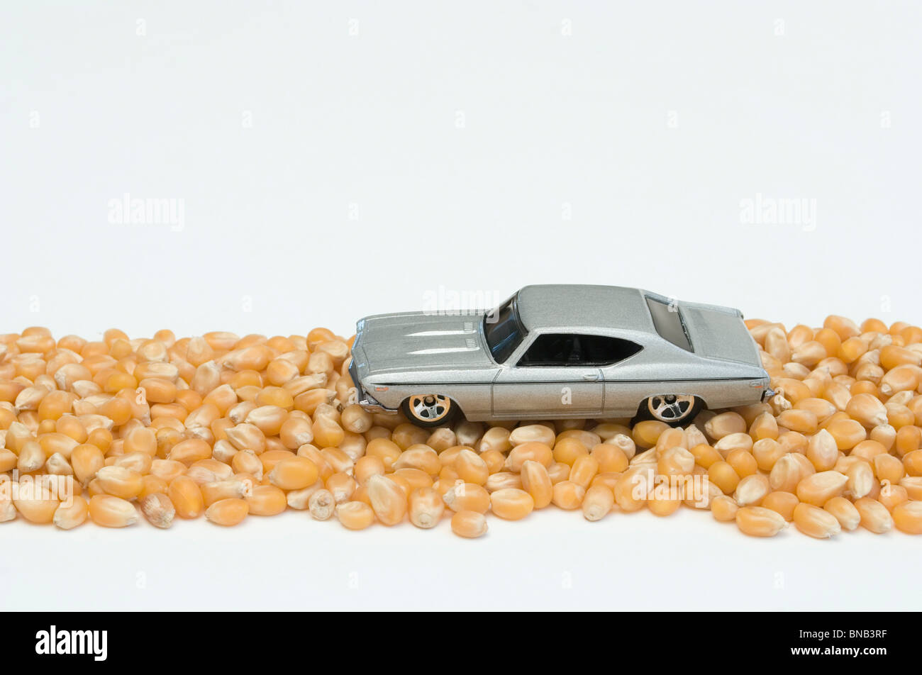 car on a road made with corns Stock Photo
