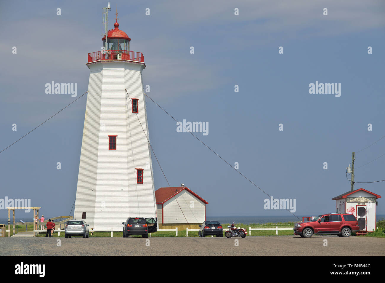 Miscou Lighthouse on Miscou Island New Brunswick Canada in summer Stock Photo