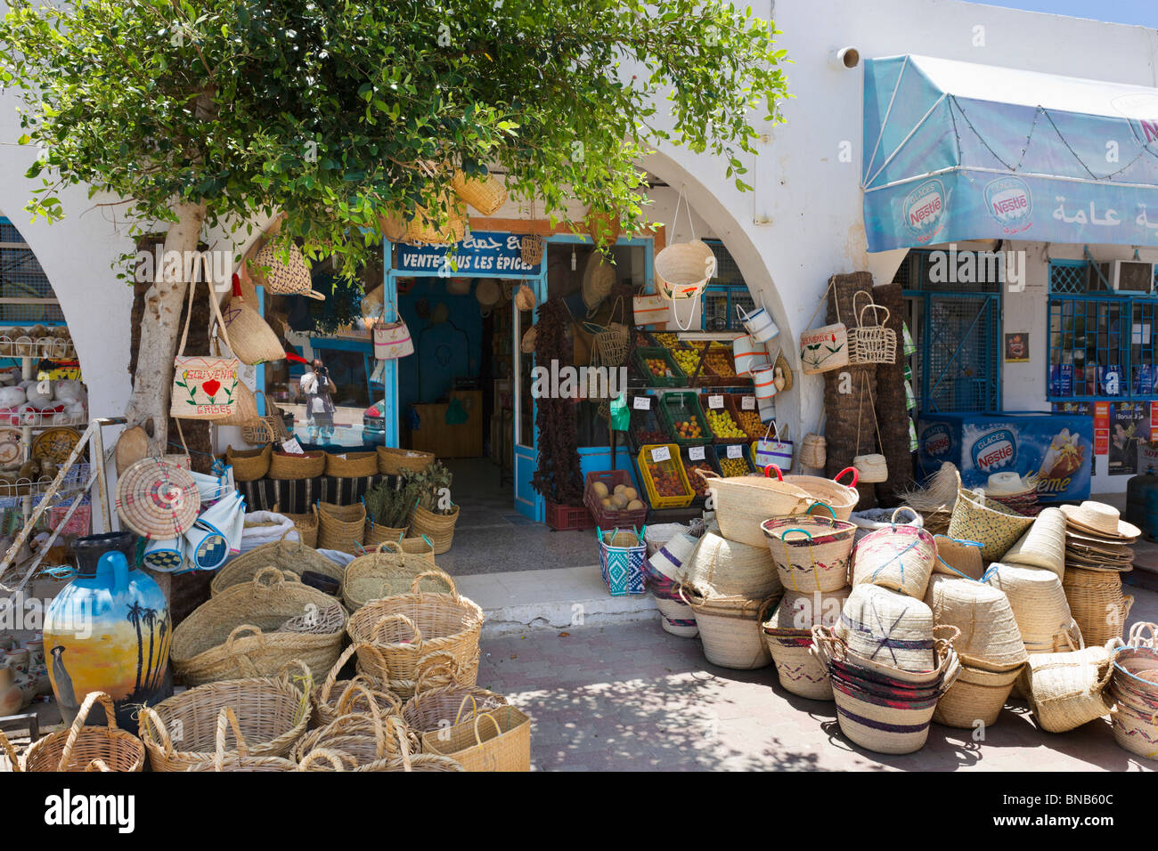 Shops selling spices and wicker baskets in the village of Guellala, Djerba, Tunisia Stock Photo