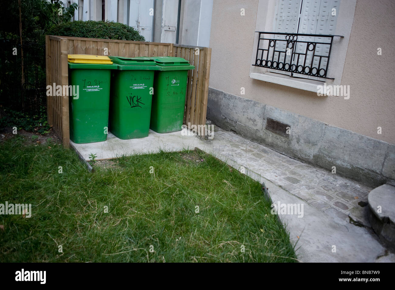 Facade Apartment, Paris, France, Front, Garbage Cans wheely bin in