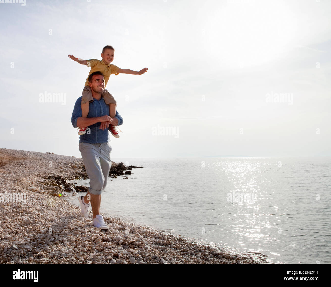Father and son at the beach Stock Photo - Alamy