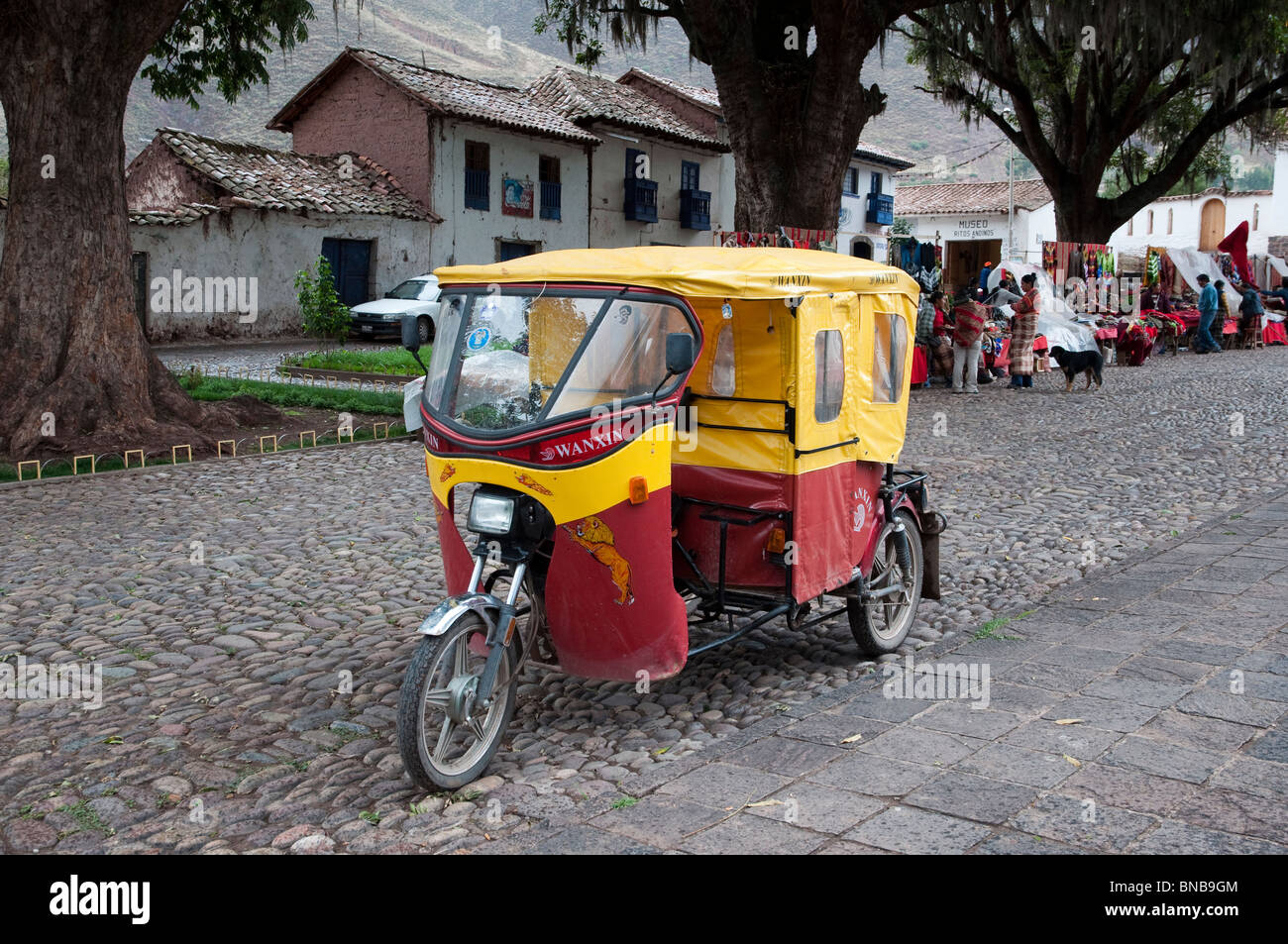 Tricycle transportation in the Urubamba Valley village of Andahuaylillas,  Peru Stock Photo - Alamy