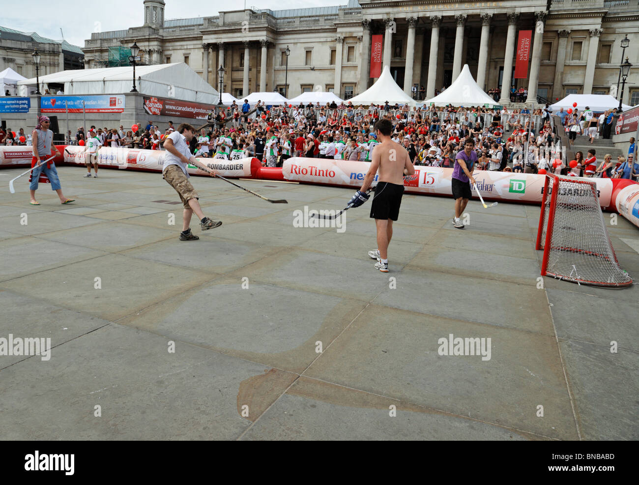 People playing hockey on Trafalgar Square. Stock Photo