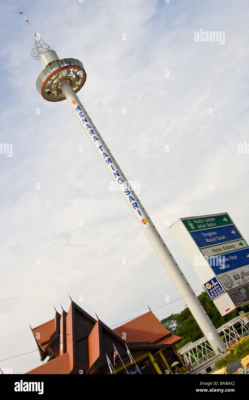 Tilted image of Menara Taming Sari tower in Melaka offering 360 degree views over the town of Melaka Stock Photo
