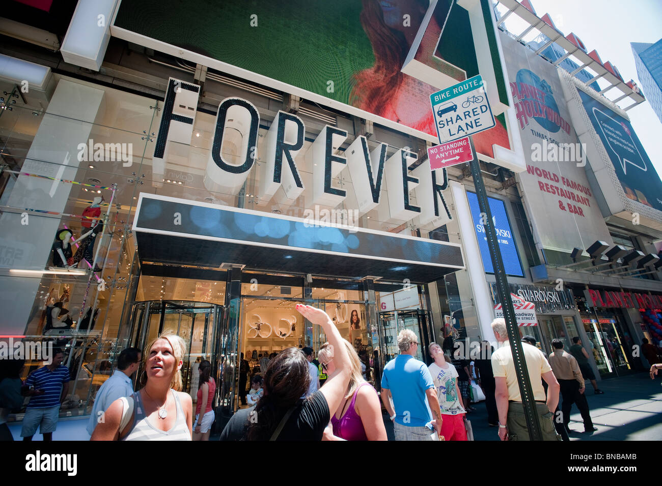 Exterior Facade Of Forever 21 On 14th Street Manhattan New York City  African American Woman Pushing A Stroller Walks Passed Forever 21  Storefront Busy New York Street Stock Photo - Download Image Now - iStock