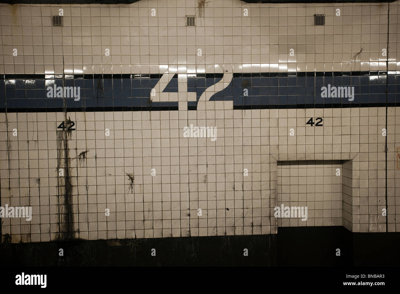 The Damaged And Dirty Tile Wall In The 42nd Street Times Square Station On The Eighth Avenue Line In New York Stock Photo Alamy