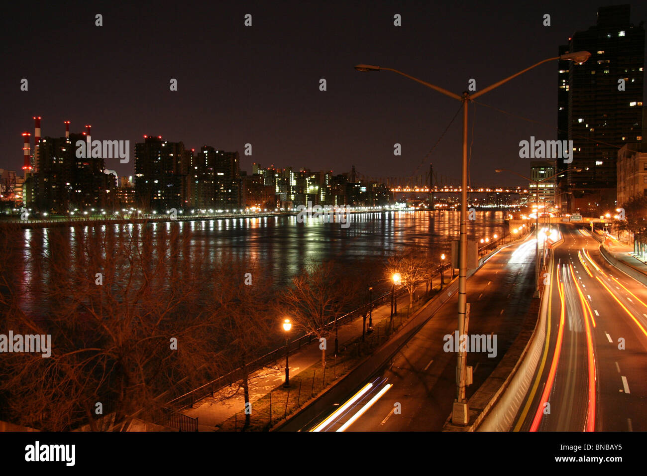 Urban Traffic at Night on FDR Drive in New York City Stock Photo