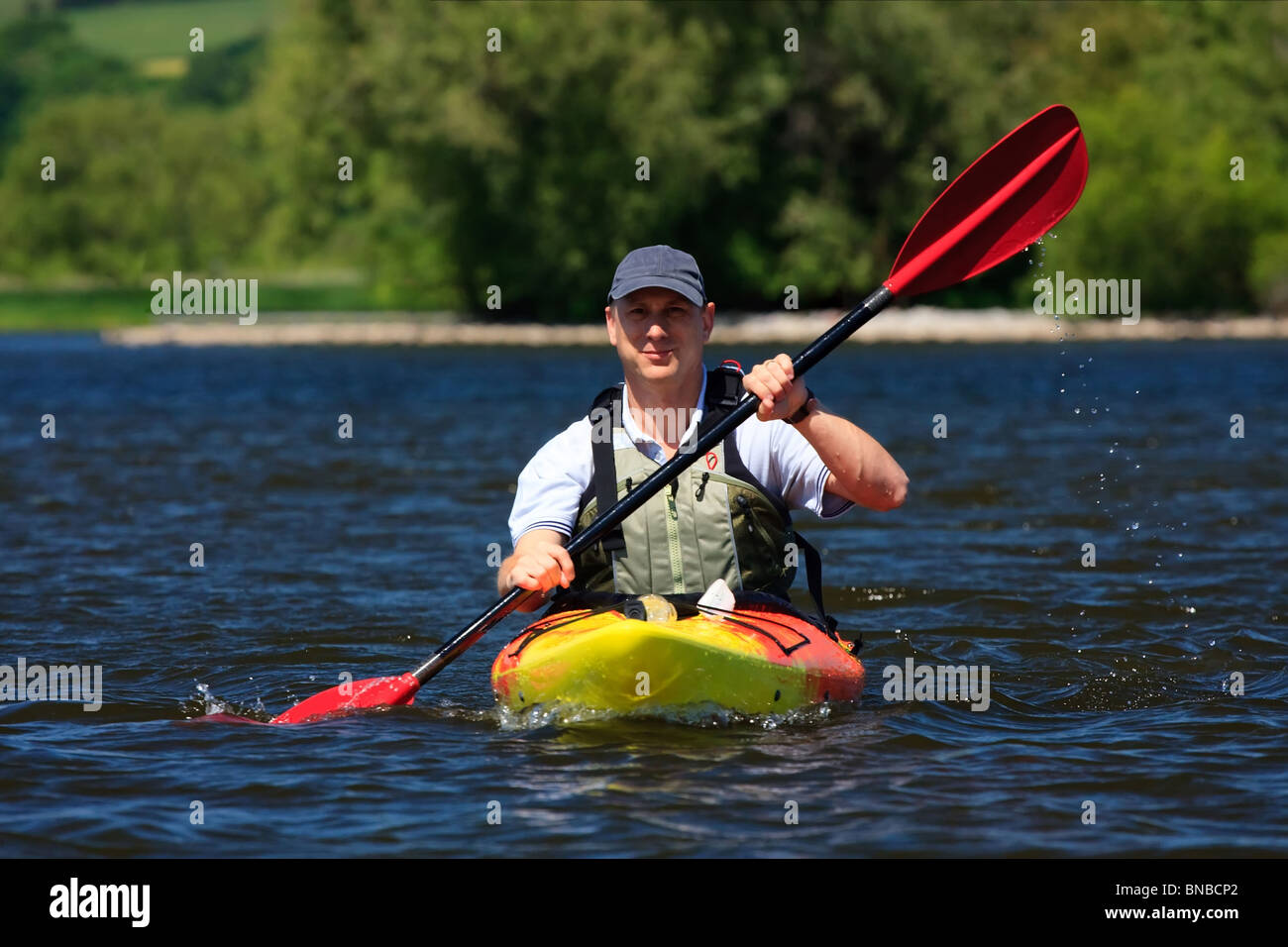 Man paddling in canoe on hi-res stock photography and images - Alamy