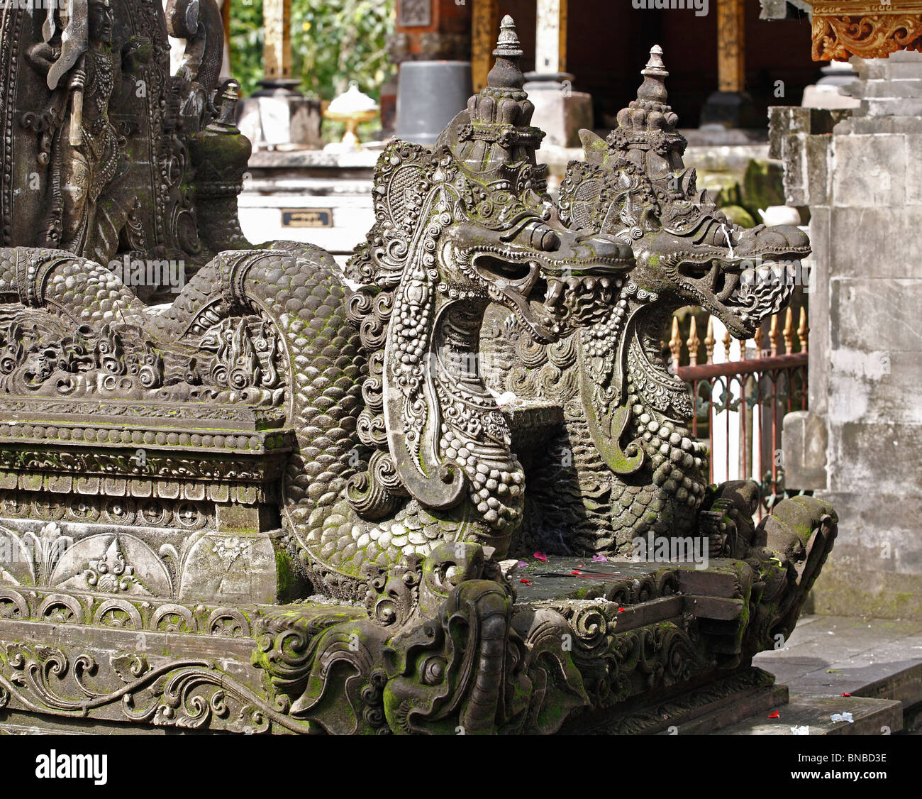 two stone dragon statues at Pura Tirta Empul Temple, Tampak Siring