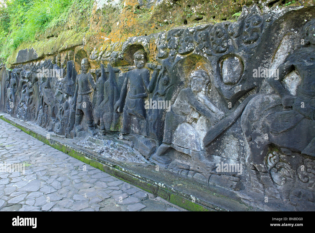 Yeh Pulu relief is an ancient complex of rock carvings at Bedulu, near Ubud, Bali. Stock Photo