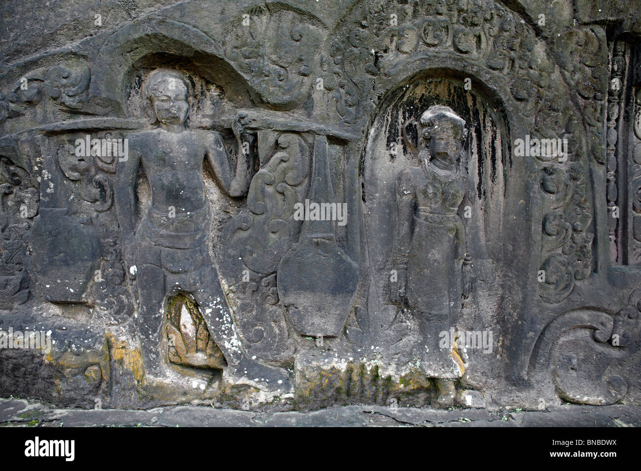 Yeh Pulu relief is an ancient complex of rock carvings at Bedulu, near Ubud, Bali. Stock Photo