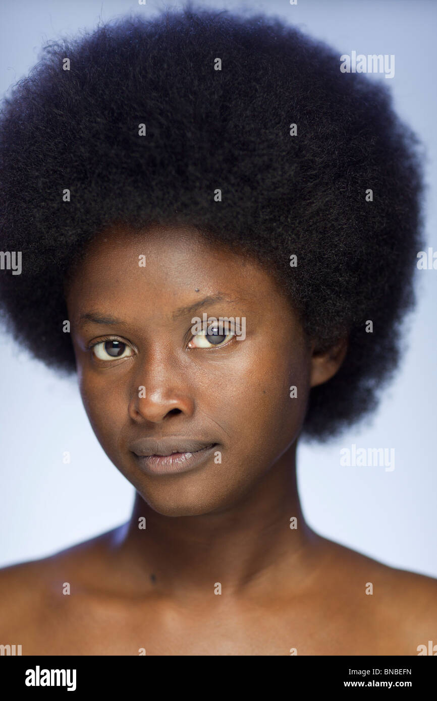 Close-up portrait of young African-American woman with retro revival afro hair style Stock Photo
