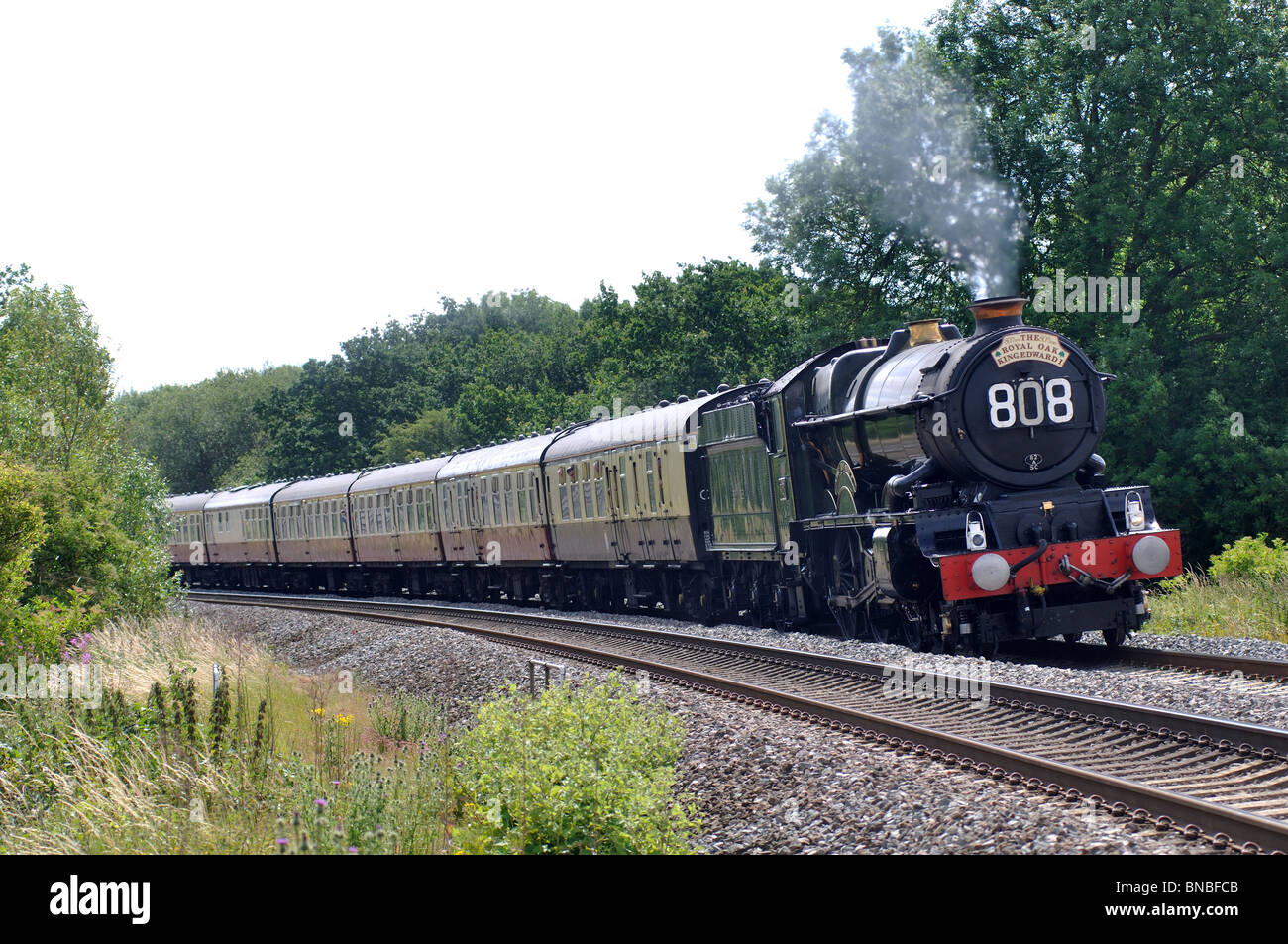 GWR King Class No. 6024 'King Edward I' pulling steam excursion train at Hatton Bank, Warwickshire, UK Stock Photo