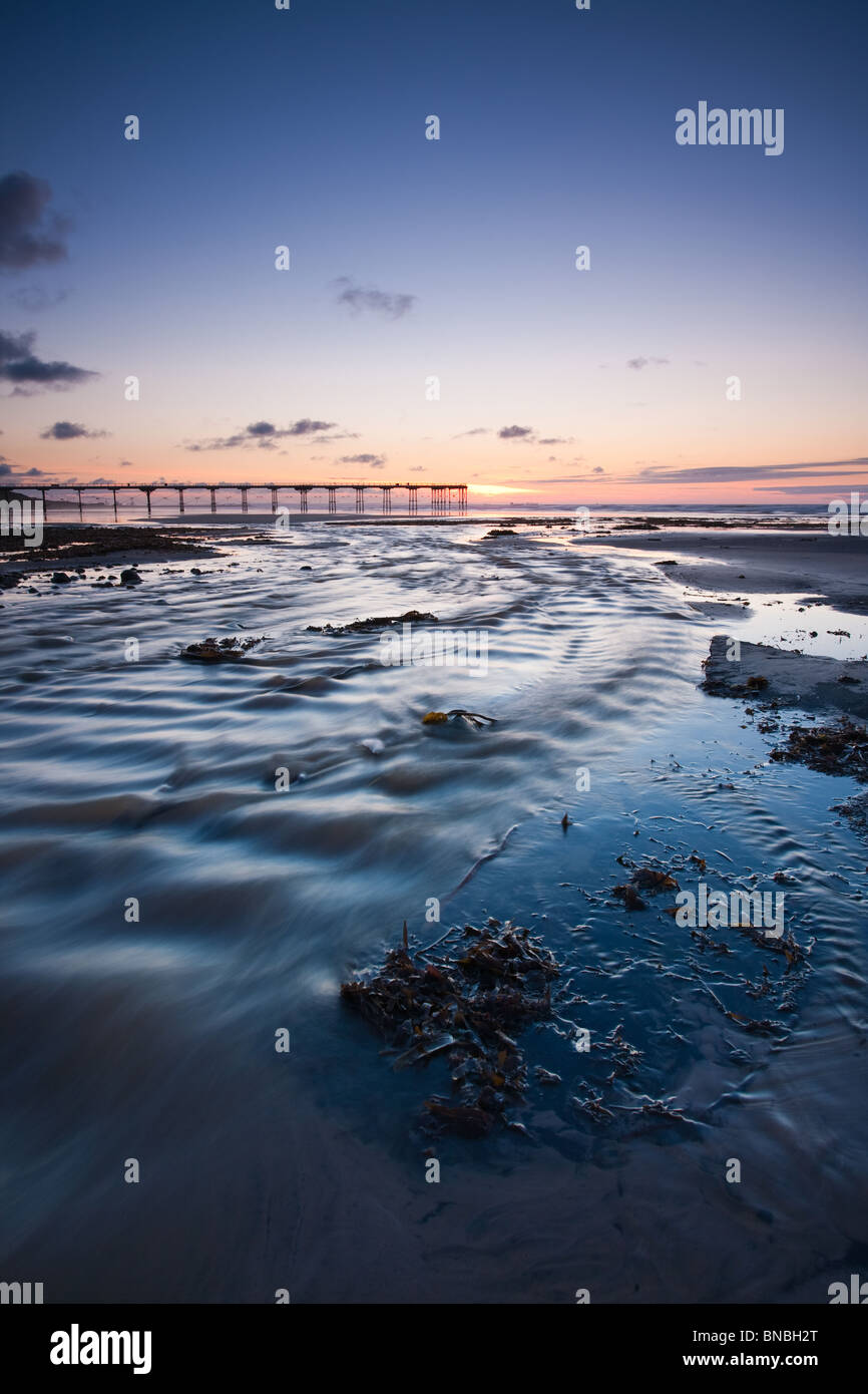 Late evening Saltburn beach and eck with natures colours after sunset  Stock Photo
