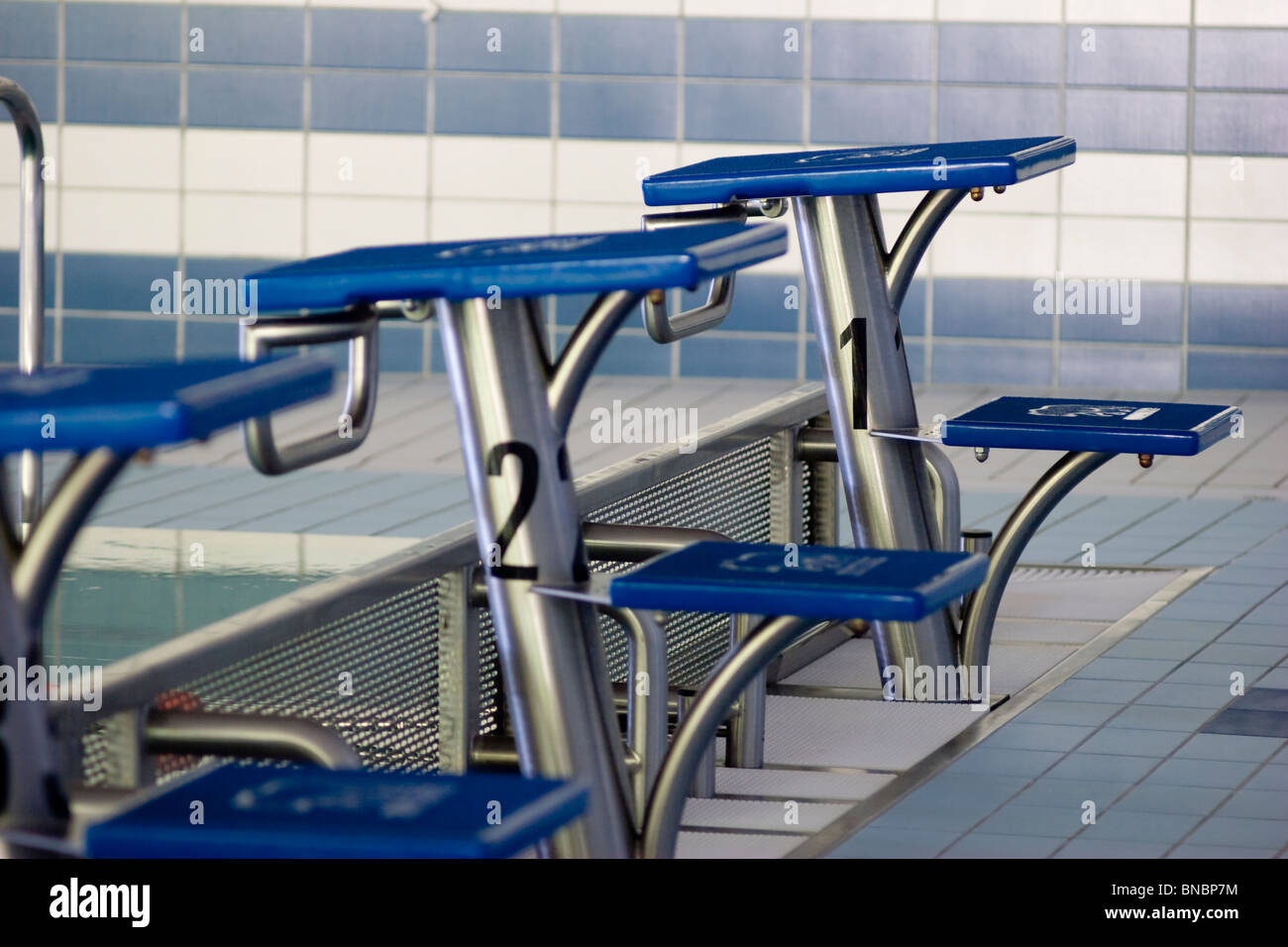 starting platform  on swimming pool Stock Photo