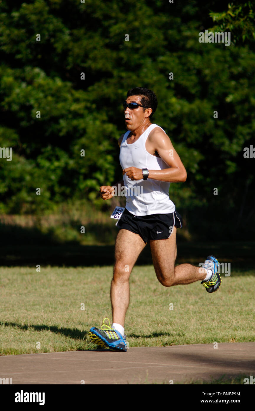 Male and female Marathon runners and joggers of all ages, shapes, sizes