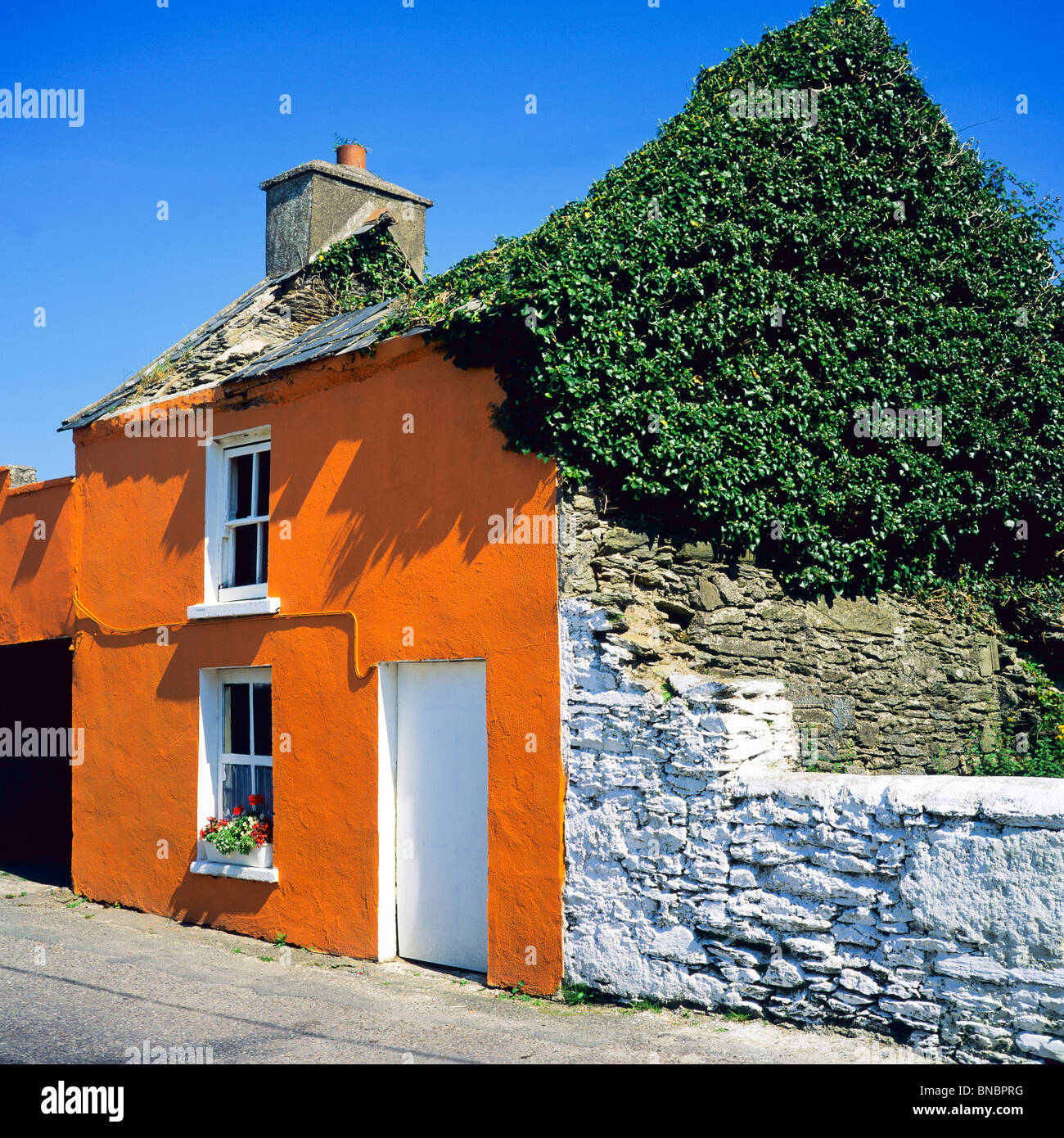 VERMILION PAINTED HOUSE EYERIES BEARA PENINSULA COUNTY CORK IRELAND