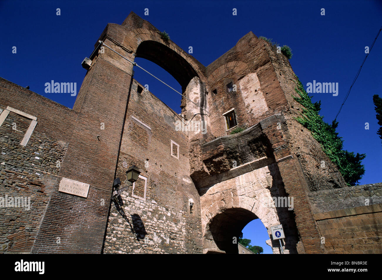 Italy, Rome, Celio, ancient Roman fortifications of the Servian Walls, arch of Dolabella gate and Nero aqueduct ruins Stock Photo