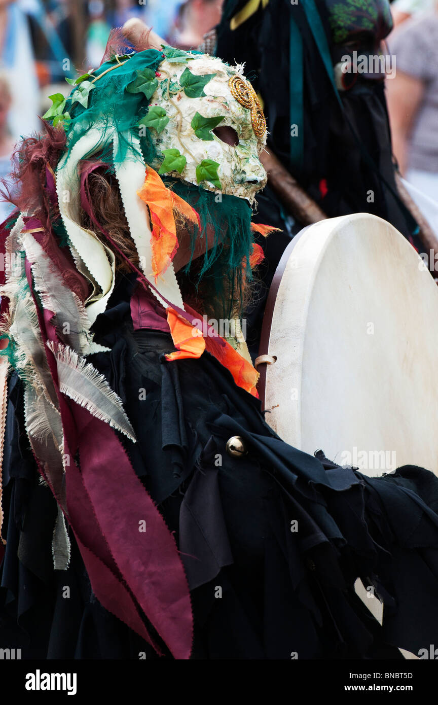 Medieval Masked Bedlam Morris Dancer with bodhran at the  Tewkesbury medieval festival 2010. Tewkesbury, Gloucestershire, England Stock Photo