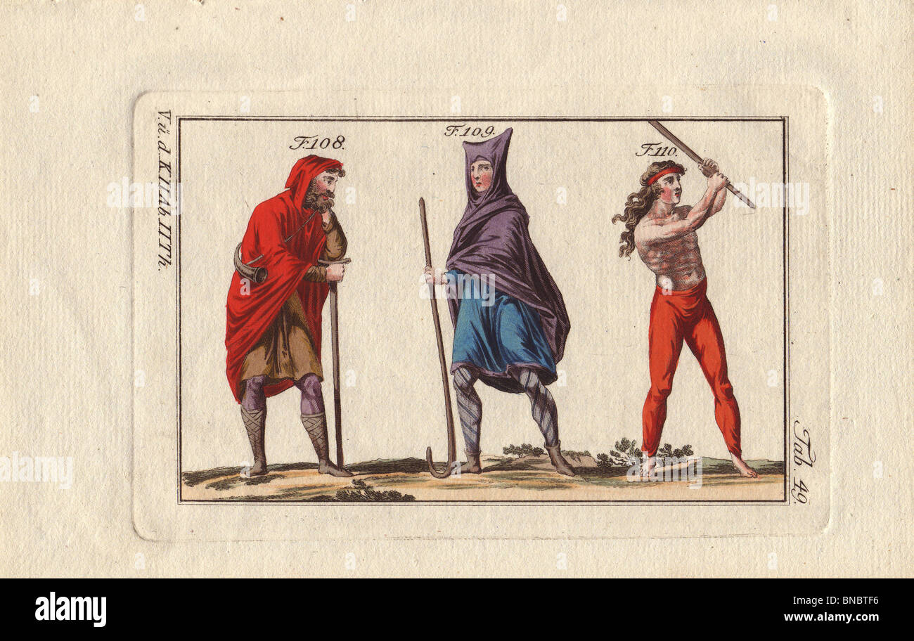 Norman shepherds in capuce (hooded cloak) and peasant in red trousers. Stock Photo
