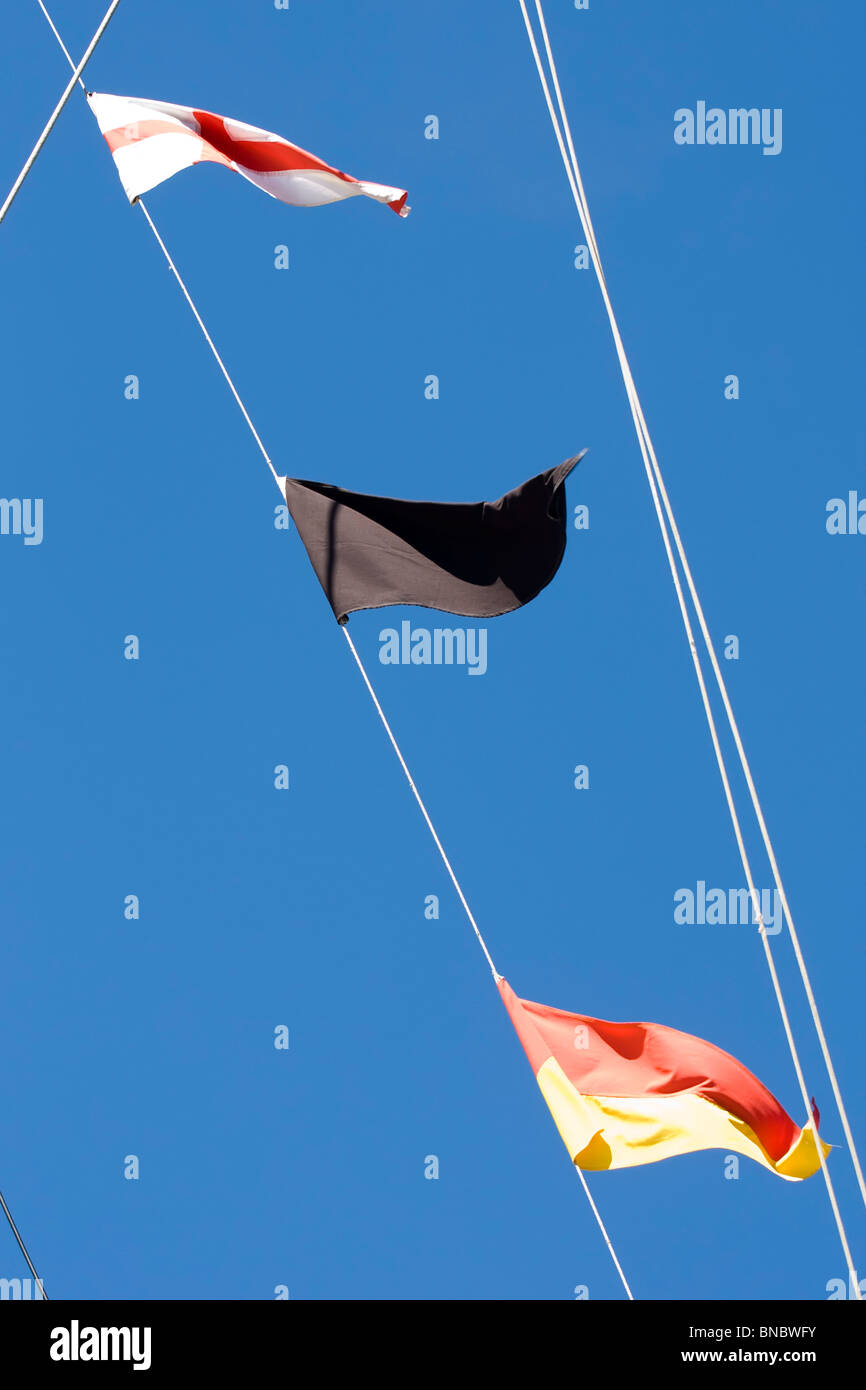 Three nautical flags to signals to other ships Stock Photo Alamy