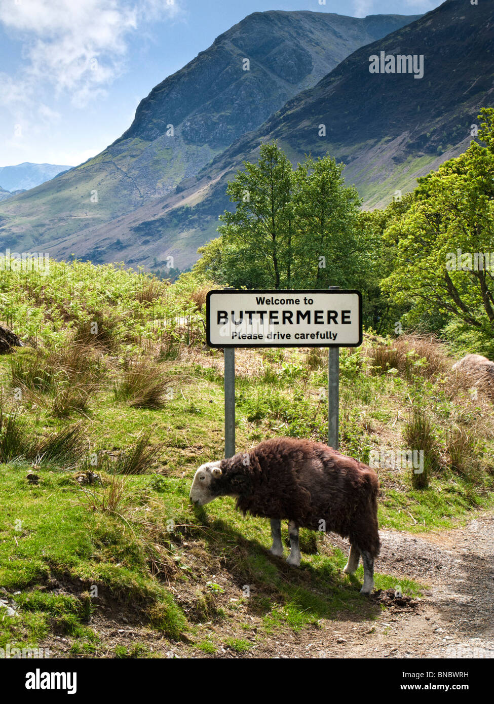 Buttermere, Lake District, UK with village road sign Stock Photo