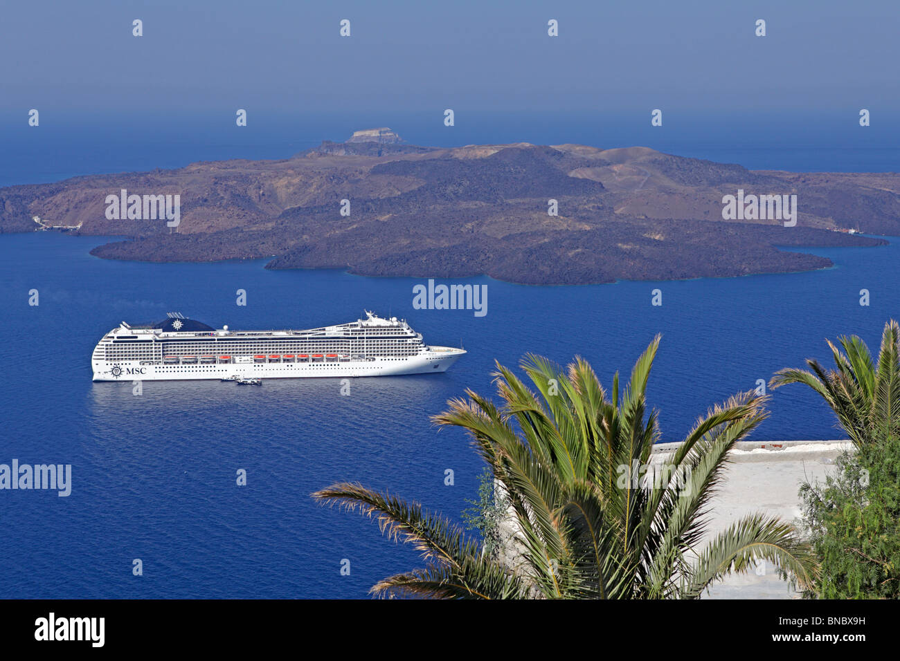 cruise liner anchoring off Santorini Island, Cyclades, Aegean Islands, Greece Stock Photo