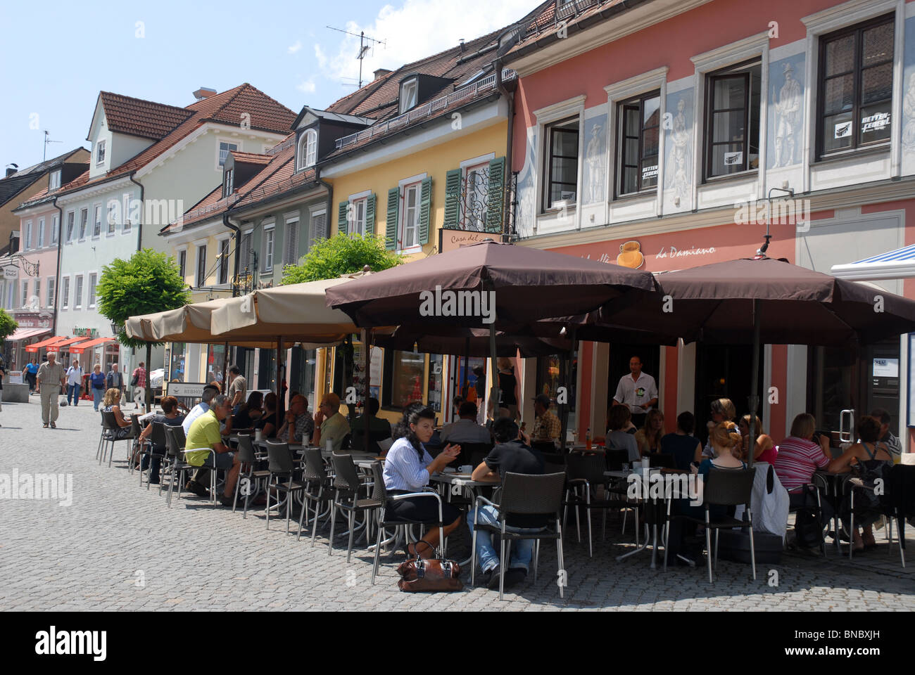 outdoor cafe / restaurant on teh main street of Murnau am Staffelsee, Garmisch-Partenkirchen, Oberbayern, Bavaria, Germany Stock Photo