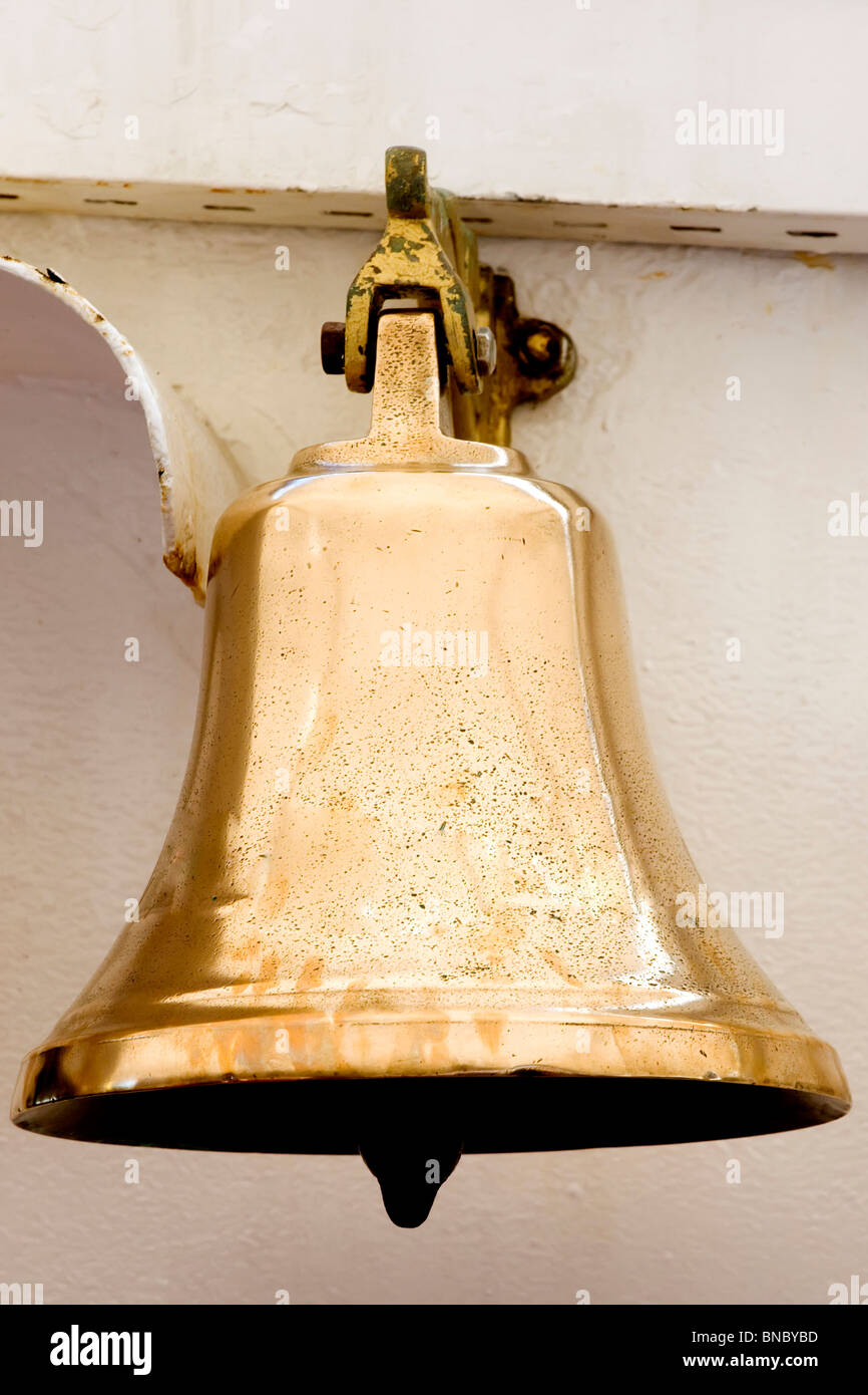 A polished brass bell warship Stock Photo