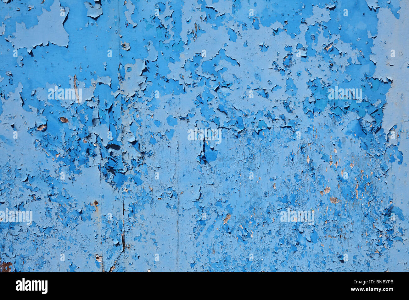 Old grungy blue paint on wooden surface Stock Photo