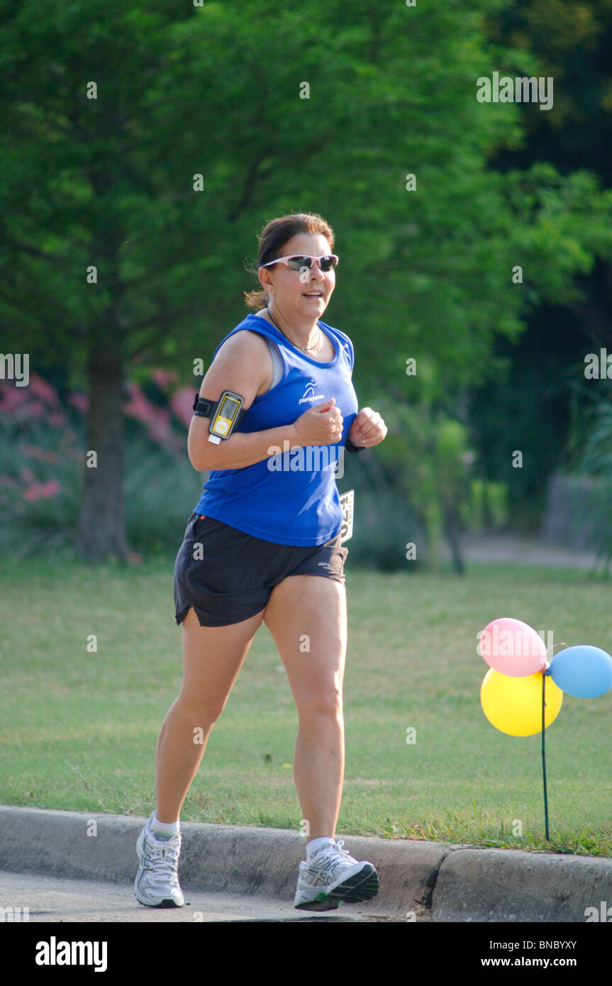 Male and female Marathon runners and joggers of all ages, shapes, sizes