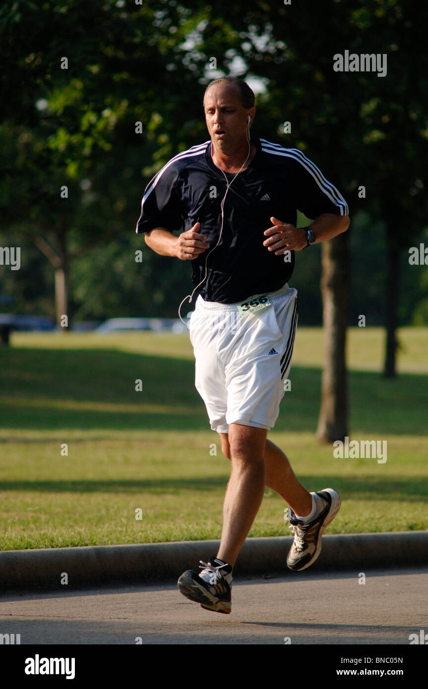 Male And Female Marathon Runners And Joggers Of All Ages Shapes Sizes