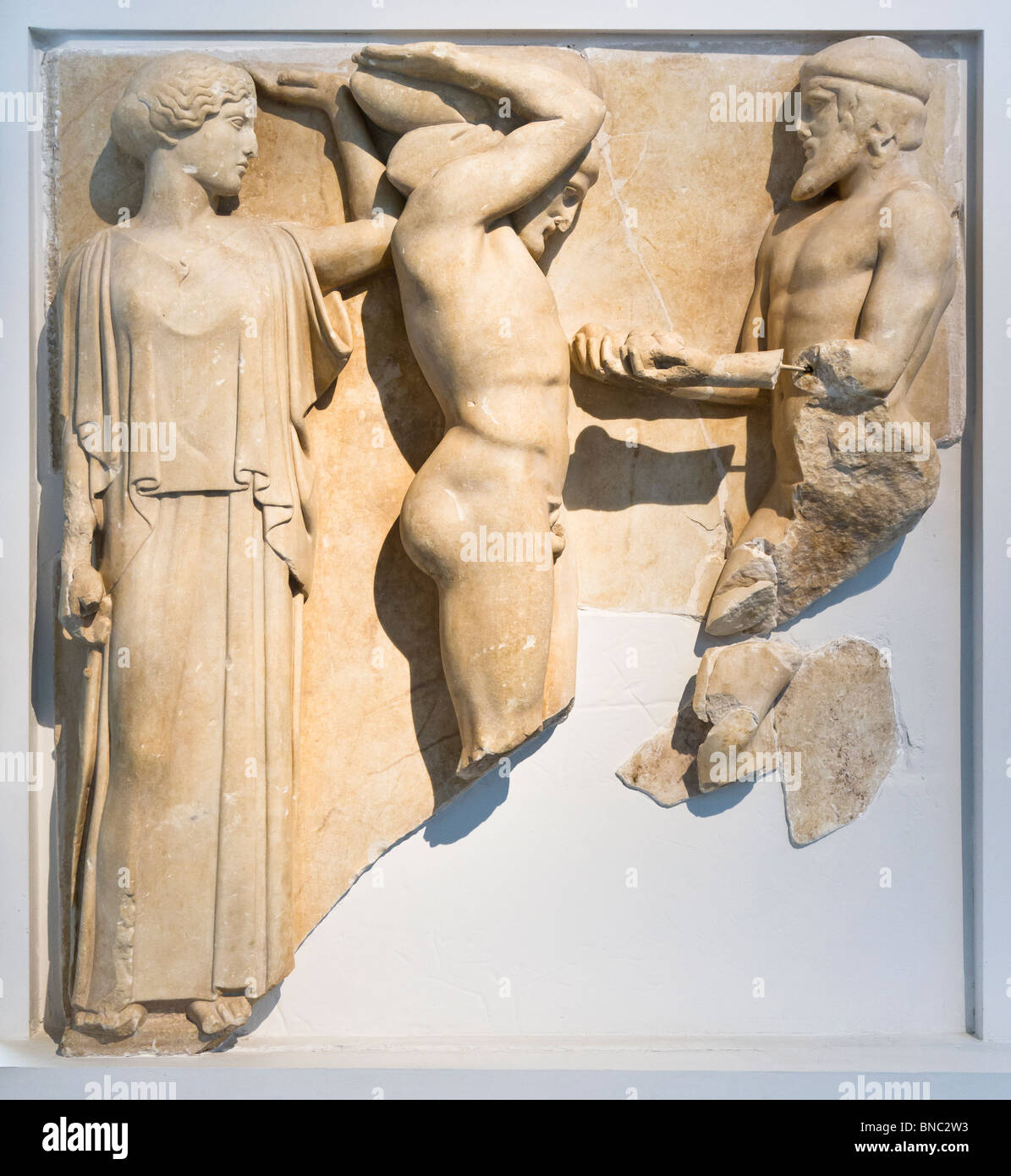 Metope 10 of the Temple of Zeus at Olympia: Herakles supports the heavens while Atlas brings him the Apples of the Hesperides. Stock Photo