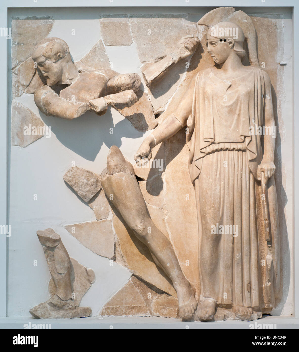 Metope 12 of the Temple of Zeus at Olympia: Herakles cleaning the stables of Augeas as Athena directs him. Stock Photo