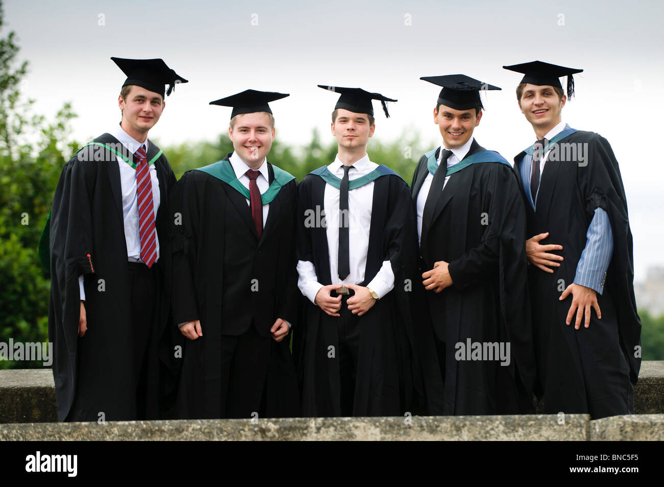 Five 5 male Students at Aberystwyth University Graduation day, Wales UK Stock Photo