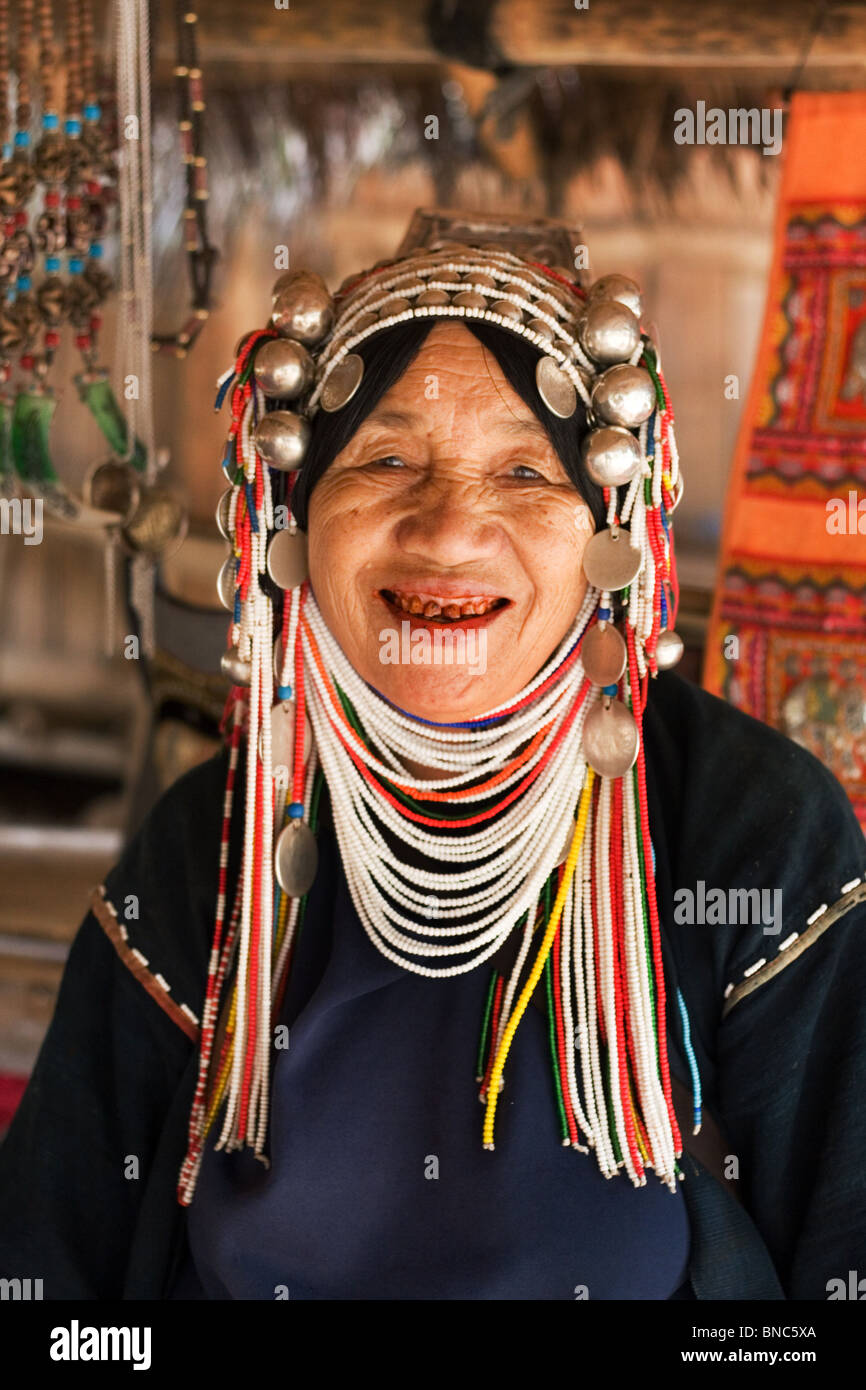 Akha hill tribe woman with traditional headdress, Tha Ton, Chiang Mai ...