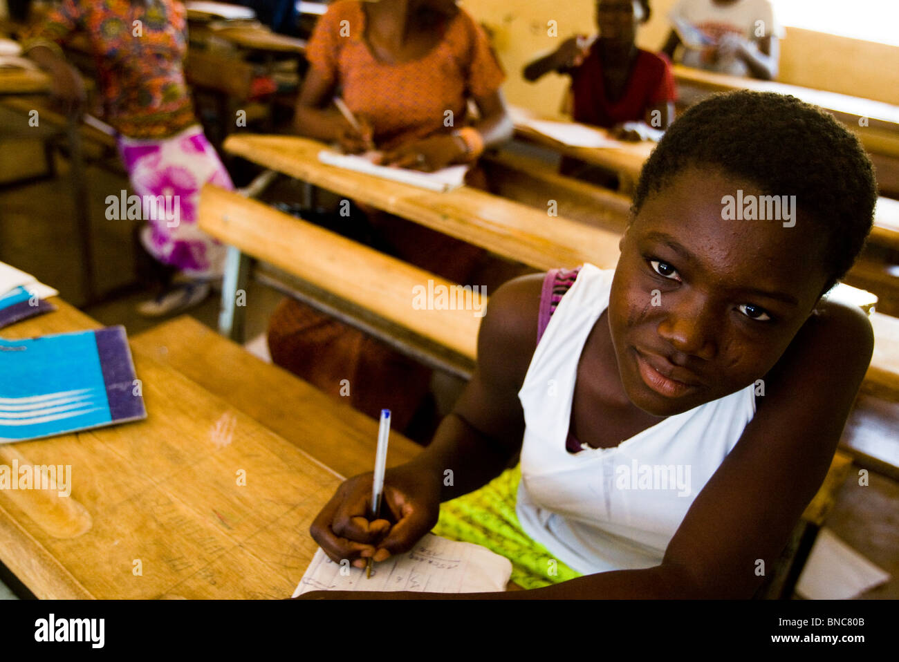 A twelve year old girl sits in class at the Youga primary school in the town of Youga. Stock Photo