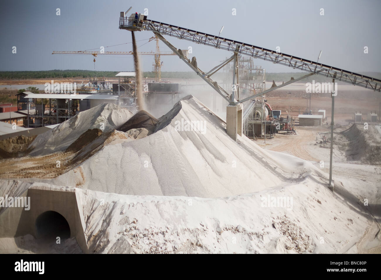 Ore is crushed into fine powder from which gold will be extracted through a chemical process at the Youga gold mine Stock Photo