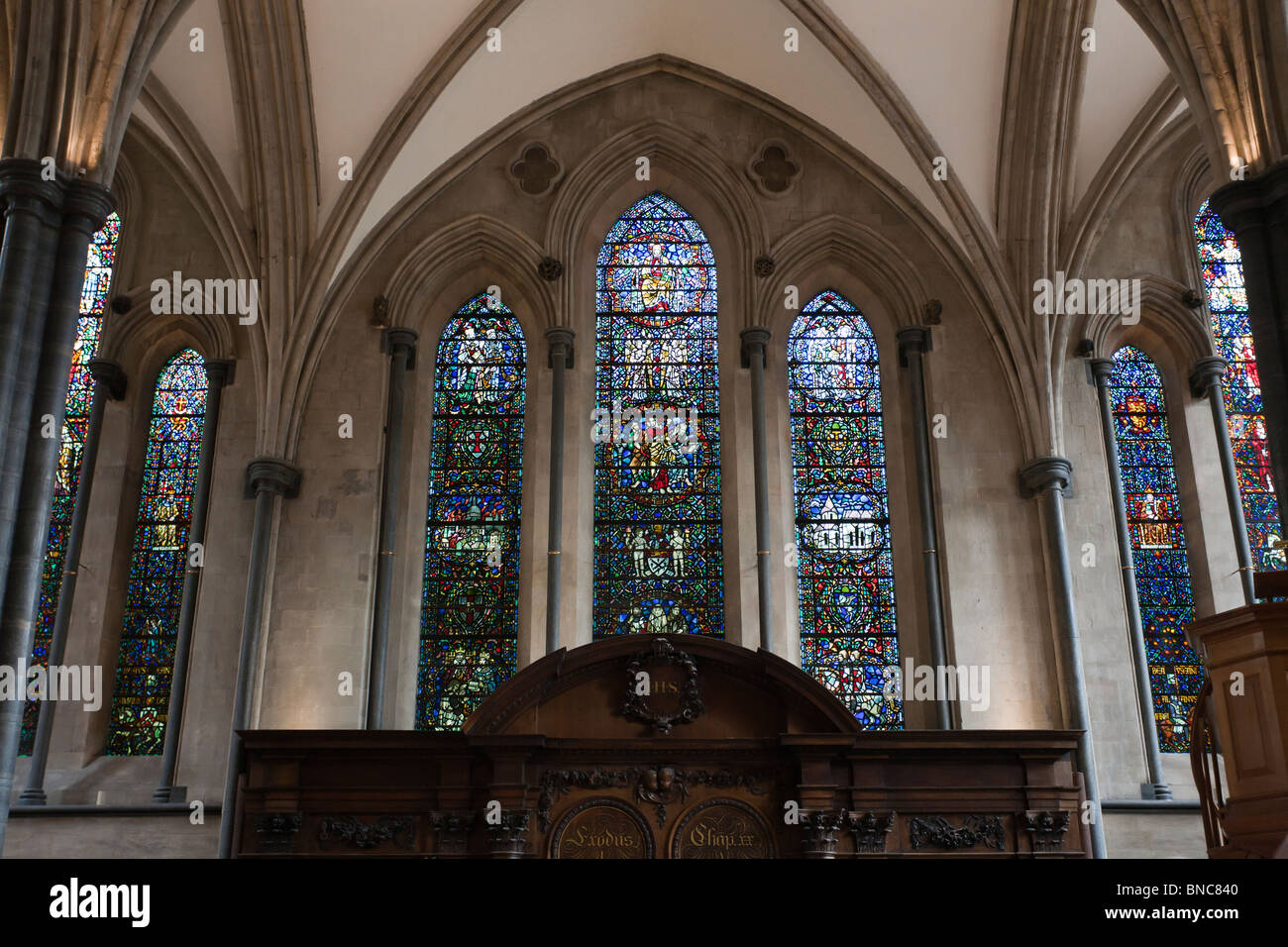 Stained Glass above the altar at the Temple Church . The magnificent stained glass windows  behind the altar Stock Photo