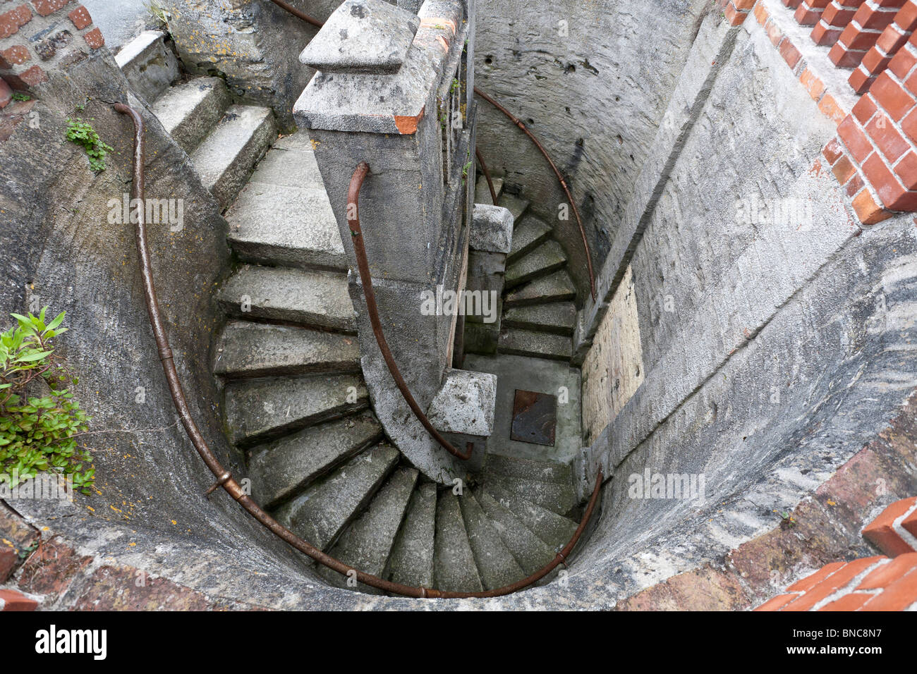 Just Steps to the Beach. A set of spiral steps down to a tunnel to Tunnel Beach Falmouth. Stock Photo